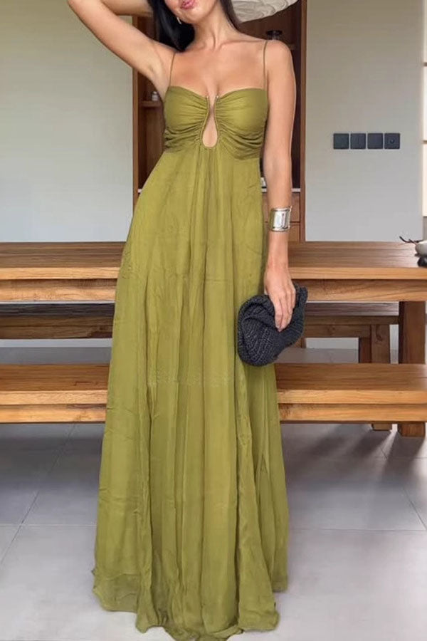Stylish green guest dress by THE WHITMORE FAMILY, featuring a fitted silhouette and elegant design for special occasions.