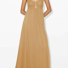 Green Taylor guest dress by THE WHITMORE FAMILY, stylish fit and elegant design, shown on a model with a flowing silhouette.