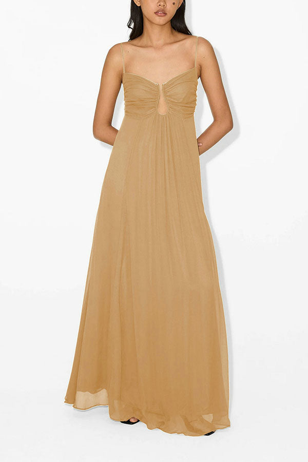 Green Taylor guest dress by THE WHITMORE FAMILY, stylish fit and elegant design, shown on a model with a flowing silhouette.