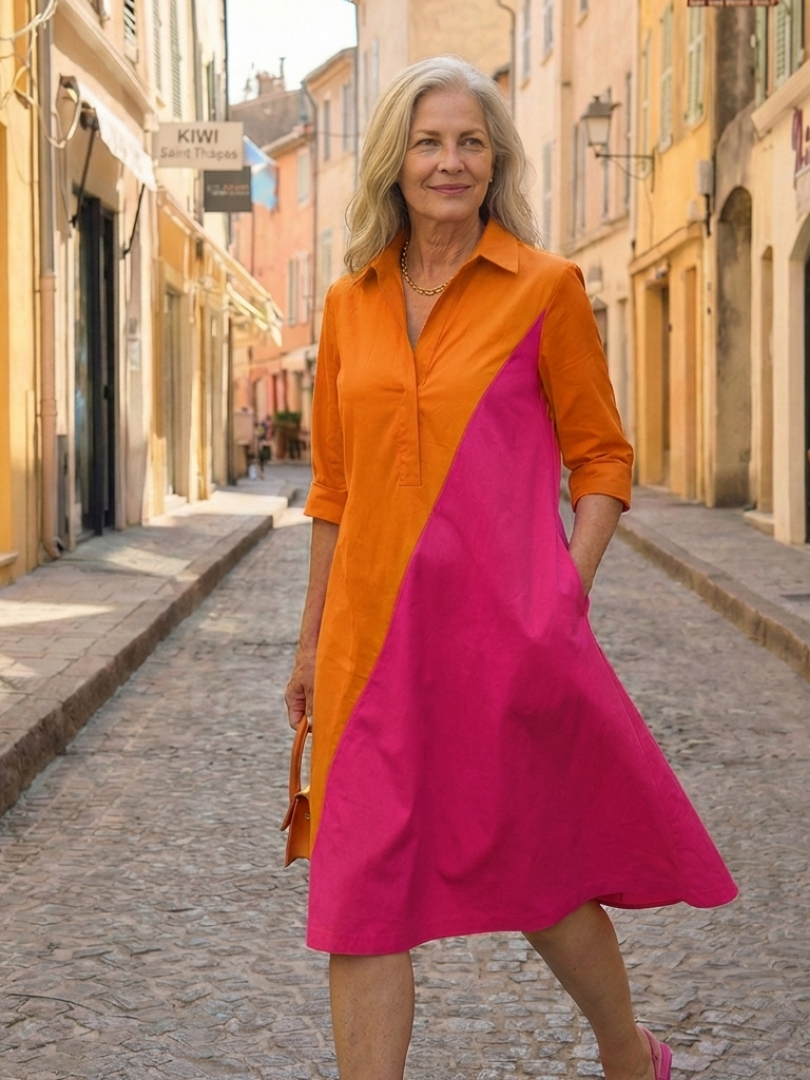 Orange Cassia Easy Morning Dress by THE WHITMORE FAMILY, featuring a relaxed fit and comfortable fabric for casual wear.