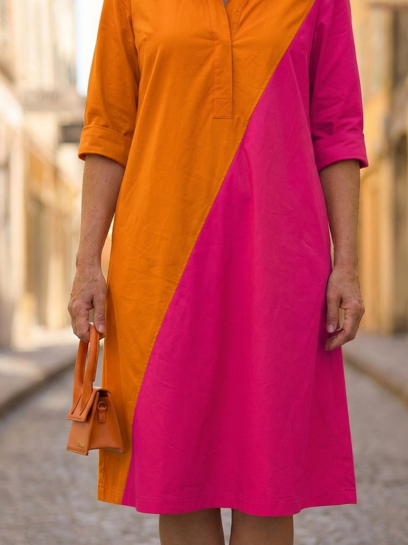 Orange Cassia Easy Morning Dress by THE WHITMORE FAMILY, featuring a comfortable, flowy design perfect for casual mornings.