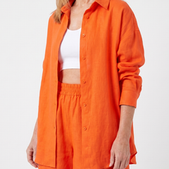 Orange Philomena cropped camisole and wide-leg pants set by THE WHITMORE FAMILY, styled together in a coordinated fashion.