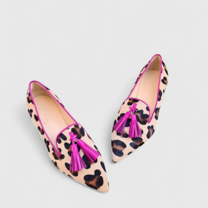 Pink Jheanna Classic Comfort Loafers by THE WHITMORE FAMILY, showing stylish slip-on footwear with a smooth finish.