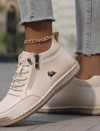 Pink Lyse™ ergonomic support sneakers by THE WHITMORE FAMILY featuring cushioned soles and breathable mesh upper.