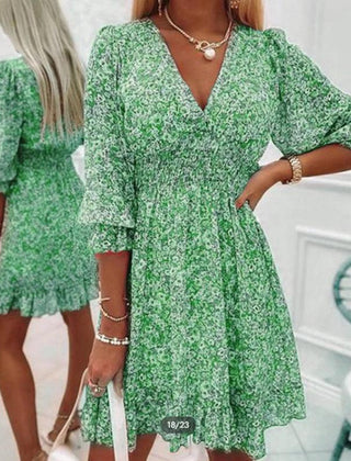 Pink Sunna Elegant Floral Dress by THE WHITMORE FAMILY, featuring intricate floral patterns and a flowing, sophisticated design.