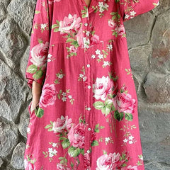 Pink floral Maddie dress by THE WHITMORE FAMILY featuring art floral print, sleeveless design, and a flowy silhouette.