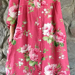 Pink floral dress named Maddie by THE WHITMORE FAMILY featuring a delicate art floral pattern on lightweight fabric.