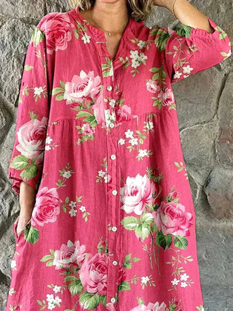 Pink floral Maddie dress from THE WHITMORE FAMILY featuring artistic rose print, sleeveless design, and lightweight fabric.