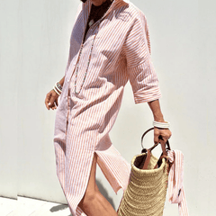 Pink Cariel maxi dress by THE WHITMORE FAMILY, featuring an elegant, breathable design and flowing fabric.