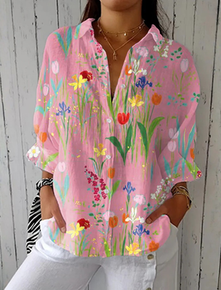 Pink Clara™ Spring Garden Blouse by THE WHITMORE FAMILY featuring floral print and lightweight fabric on a model.