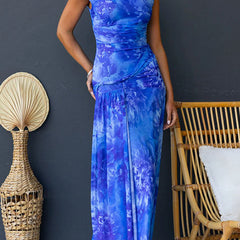 Pink Diana printed maxi dress by THE WHITMORE FAMILY featuring a flowing silhouette and elegant floral pattern.