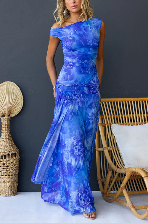 Pink Diana elegant printed maxi dress by THE WHITMORE FAMILY, flowing fabric, floral pattern, and stylish design.