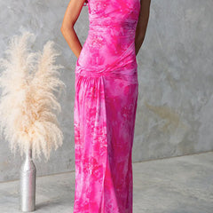 Pink Diana printed maxi dress by THE WHITMORE FAMILY, flowing fabric with elegant floral pattern and fitted waist.