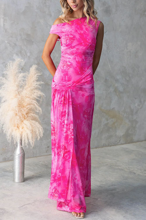 Pink Diana printed maxi dress by THE WHITMORE FAMILY, flowing fabric with elegant floral pattern and fitted waist.