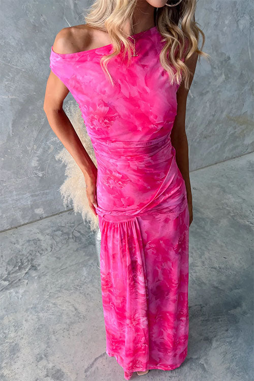 Pink printed maxi dress called Diana by THE WHITMORE FAMILY featuring an elegant and flowing design, suitable for formal occasions.