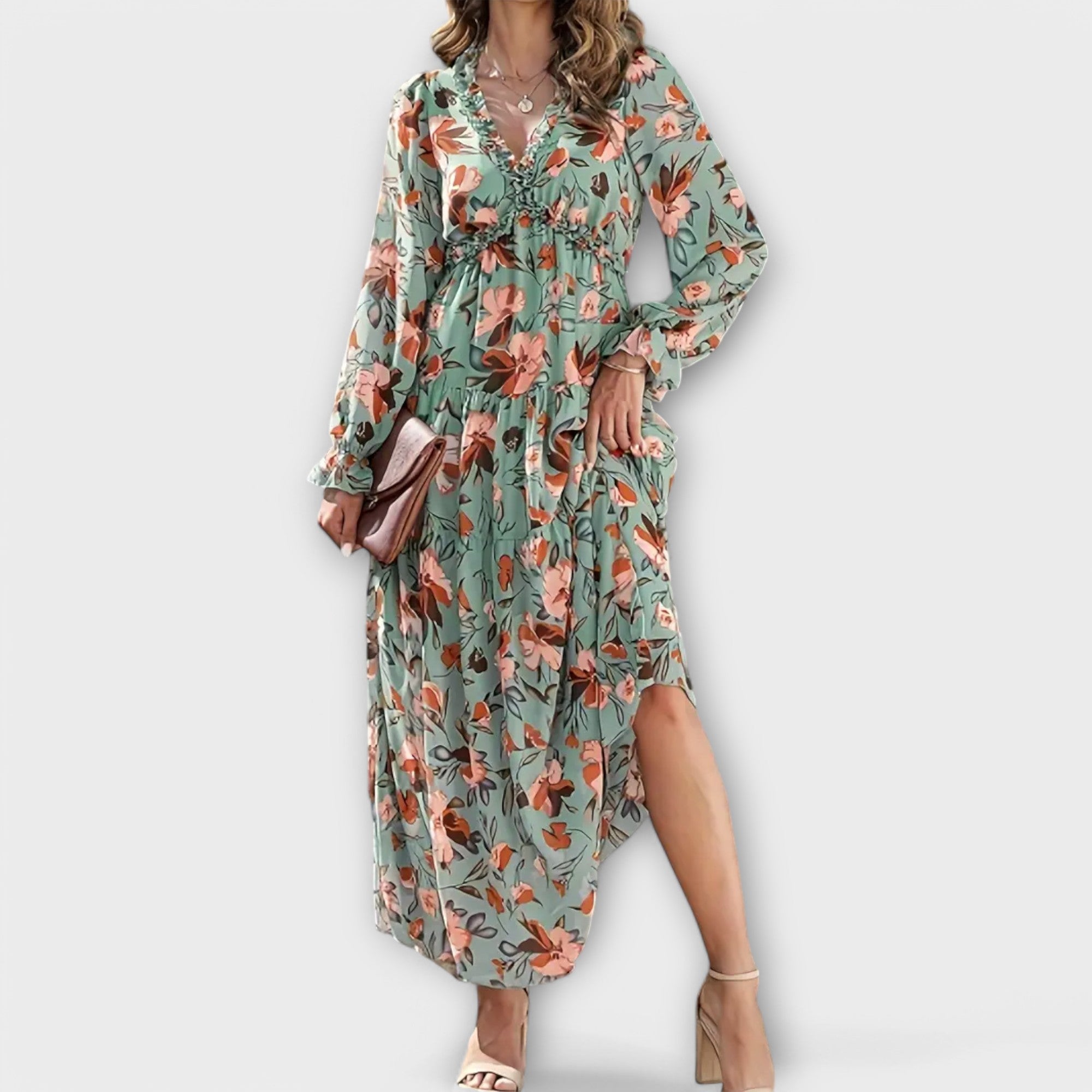 Pink Liv Helen Elegant Dress by THE WHITMORE FAMILY, featuring a stylish design and flowy fabric for a sophisticated look.