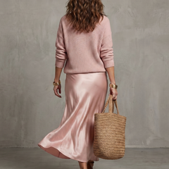 Pink satin bias skirt and knit layer set from THE WHITMORE FAMILY's Luciana collection, perfect for fall fashion.