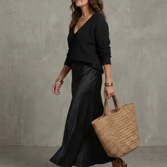 Pink bias fall satin skirt and knit layer set from THE WHITMORE FAMILY's Luciana collection, stylish and comfortable for fall.