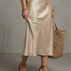 Pink satin bias fall skirt and knit layer set from THE WHITMORE FAMILY's Luciana collection, styled for a cozy fall look.