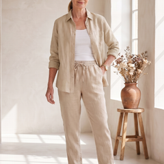 Pink Noor long sleeve shirt and tapered pants set by THE WHITMORE FAMILY, casual and stylish outfit for women.