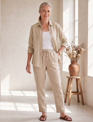 Pink Noor long sleeve shirt and tapered pants set by THE WHITMORE FAMILY, casual and stylish outfit for women.