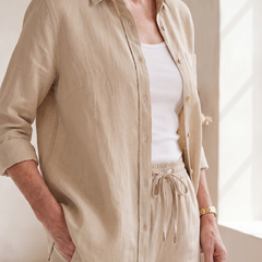 Pink Noor long sleeve shirt and tapered pants set by THE WHITMORE FAMILY, styled together for a modern, casual look.