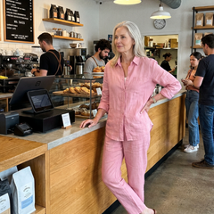 Pink Noor long sleeve shirt and tapered pants set by THE WHITMORE FAMILY, styled for a casual, modern look.