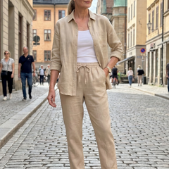Pink Noor long sleeve shirt and tapered pants set by THE WHITMORE FAMILY, stylish and comfortable for casual wear.