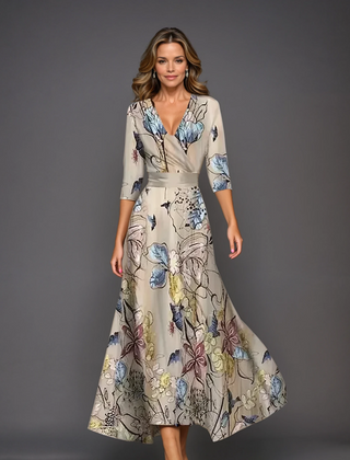 Pink Patricia chic dress with floral print by THE WHITMORE FAMILY, featuring a stylish, elegant design perfect for special occasions.