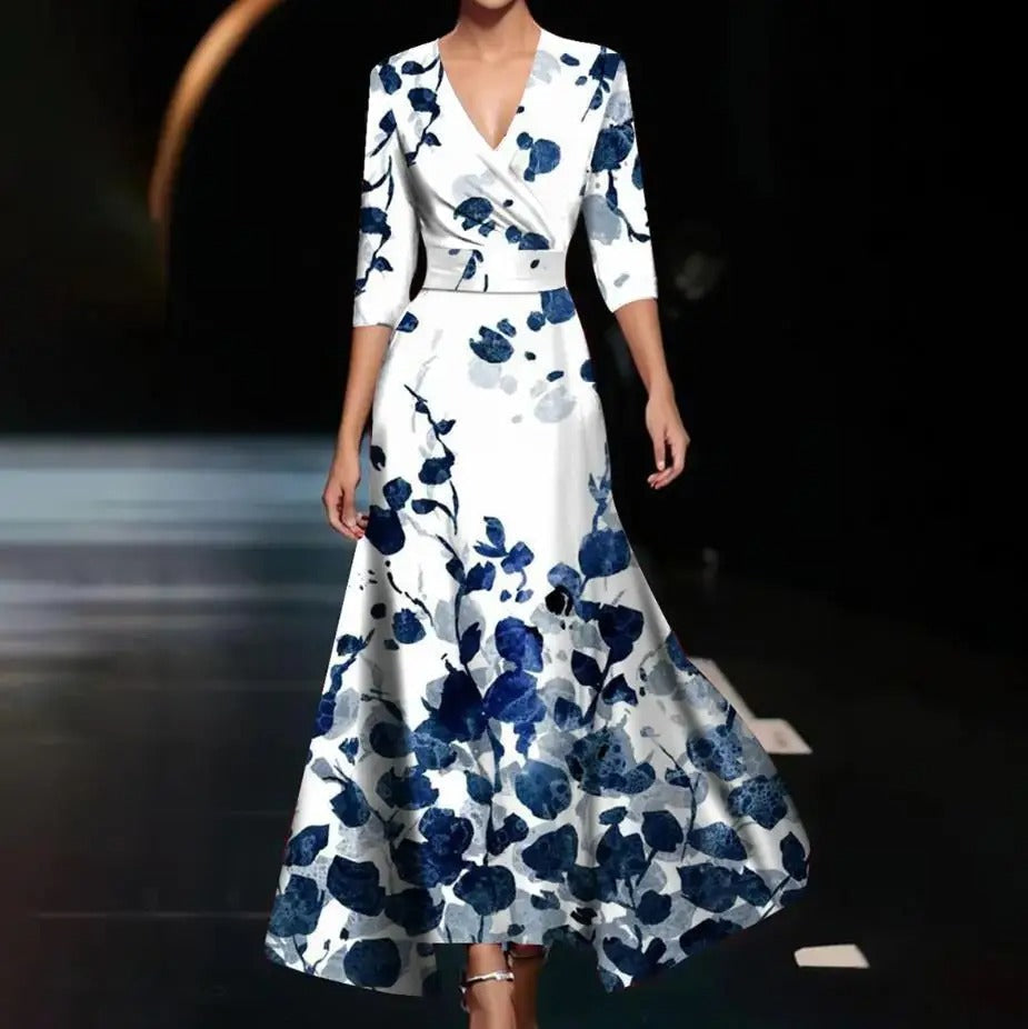 Pink Patricia chic dress with floral print by THE WHITMORE FAMILY, showcasing elegant fabric and detailed floral design.