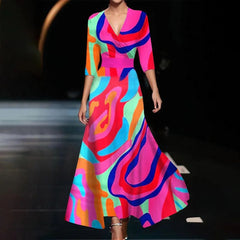 Pink Patricia chic dress with floral print by THE WHITMORE FAMILY, featuring a stylish and elegant design.