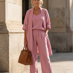 Pink three-piece relaxed top and pant set by THE WHITMORE FAMILY, casual loungewear with comfortable fit.