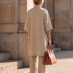 Pink three-piece relaxed top and pant set by THE WHITMORE FAMILY, featuring comfortable, casual loungewear for women.