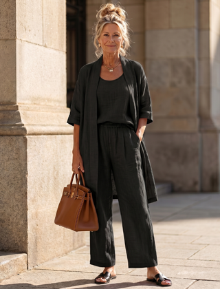 Pink three-piece relaxed top and pant set by THE WHITMORE FAMILY, featuring a comfortable, casual loungewear style.