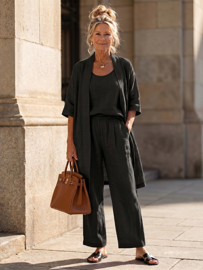 Pink three-piece relaxed top and pant set by THE WHITMORE FAMILY, featuring a comfortable, casual loungewear style.