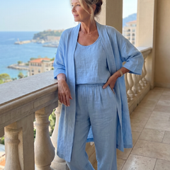 Pink three-piece relaxed top and pant set by THE WHITMORE FAMILY, featuring comfortable, casual loungewear for women.