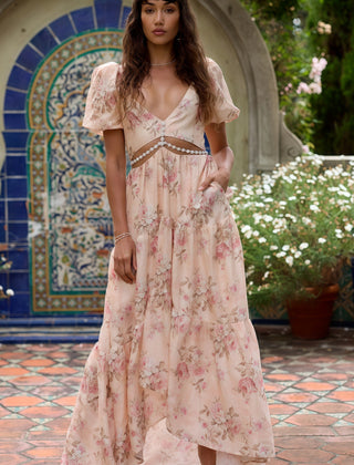 Pink Layla elegant flowing dress by THE WHITMORE FAMILY, showcasing lightweight fabric and stylish design.