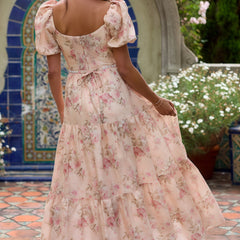 Pink Layla Elegant Flowing Dress by THE WHITMORE FAMILY, featuring lightweight fabric and stylish design, shown on a model.