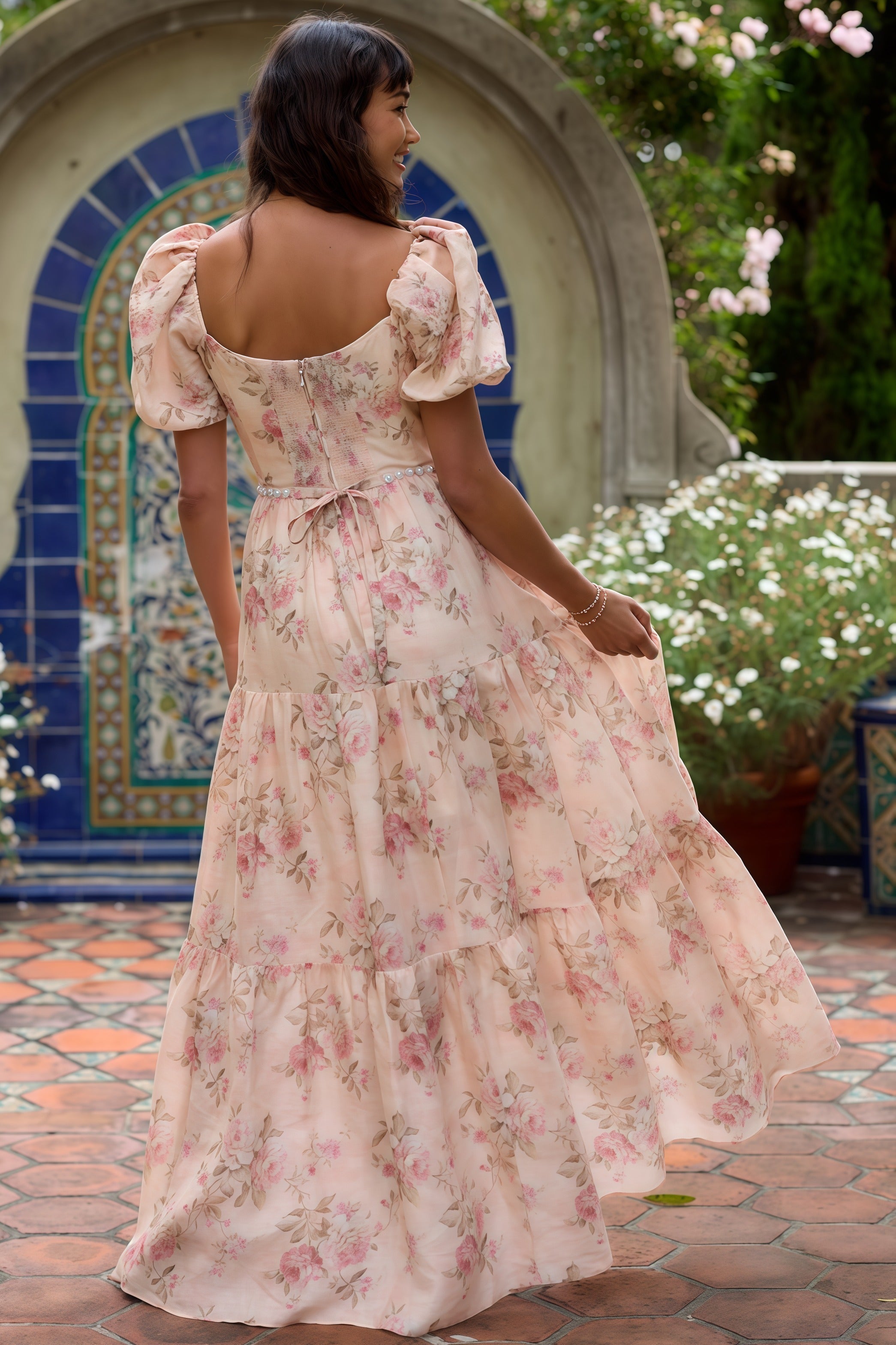 Pink Layla Elegant Flowing Dress by THE WHITMORE FAMILY, featuring lightweight fabric and stylish design, shown on a model.