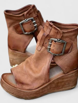 Purple Jess™ orthopedic wedge sandals by THE WHITMORE FAMILY with cushioned footbed and stylish design.