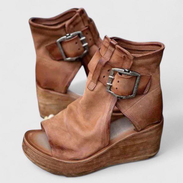 Purple Jess™ orthopedic wedge sandals by THE WHITMORE FAMILY with cushioned footbed and stylish design.