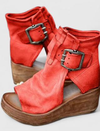 Purple Jess™ orthopedic wedge sandals by THE WHITMORE FAMILY with cushioned straps and supportive wedge heel.