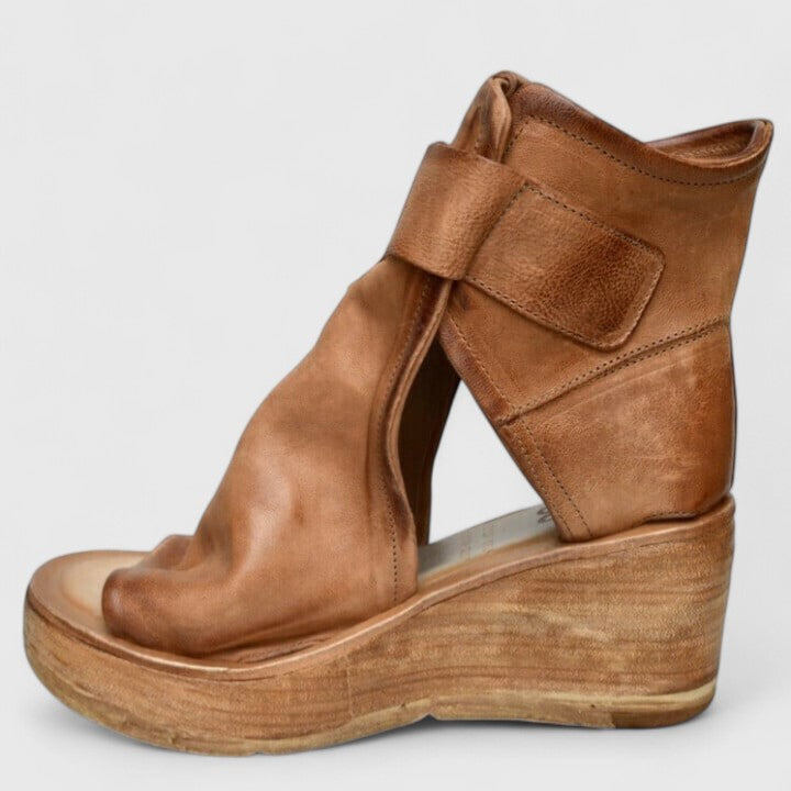 Purple Jess™ orthopedic wedge sandals by THE WHITMORE FAMILY with cushioned footbed and supportive design for comfort.