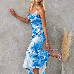 Purple floral one-shoulder dress named Anna by THE WHITMORE FAMILY, featuring a stylish design and vibrant floral pattern.