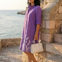 Purple Galatea Evening Garden Walk Dress by THE WHITMORE FAMILY, featuring a flowing fabric and elegant design for formal occasions.