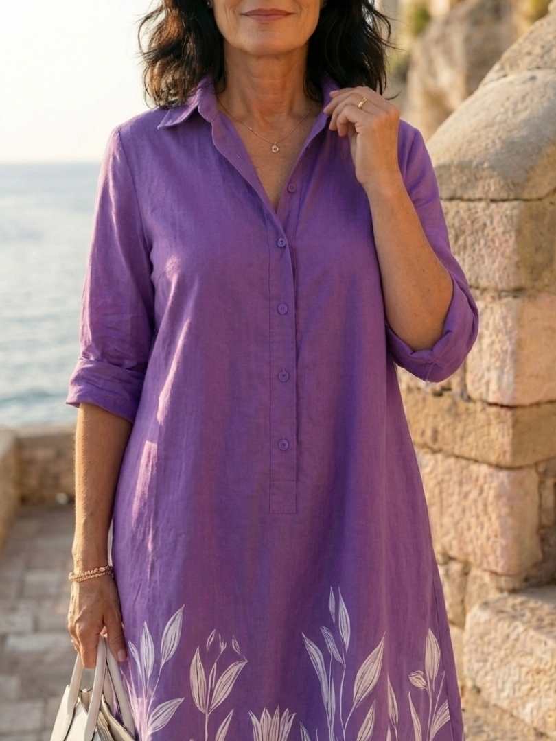 Purple Galatea Evening Garden Walk Dress by THE WHITMORE FAMILY, featuring elegant floral design and flowing fabric.