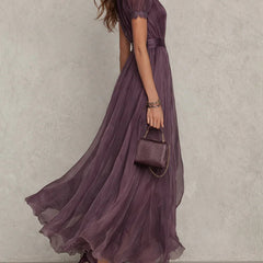 Purple Julie chiffon maxi dress with lace trim from THE WHITMORE FAMILY, featuring flowy fabric and elegant design.