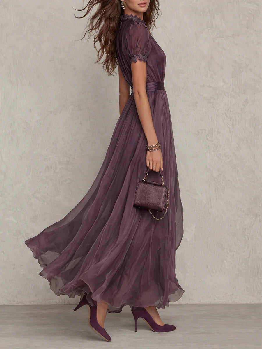 Purple Julie chiffon maxi dress with lace trim from THE WHITMORE FAMILY, featuring flowy fabric and elegant design.