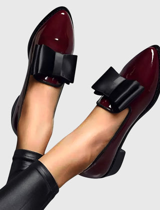 Red Anya orthopedic loafers by THE WHITMORE FAMILY featuring a classic slip-on design and comfortable sole.