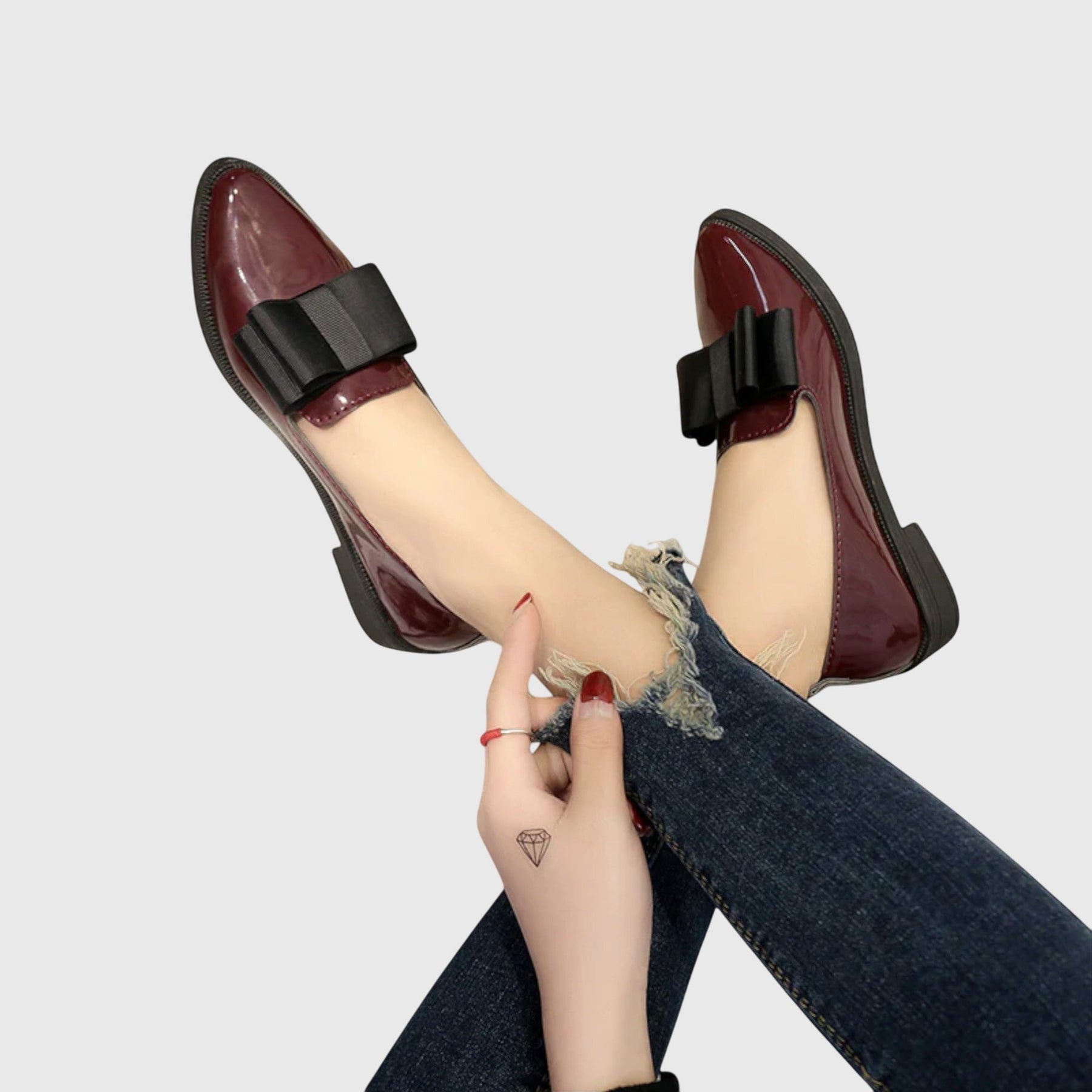Red Anya orthopedic loafers by THE WHITMORE FAMILY featuring a sleek design and comfortable fit, perfect for everyday wear.